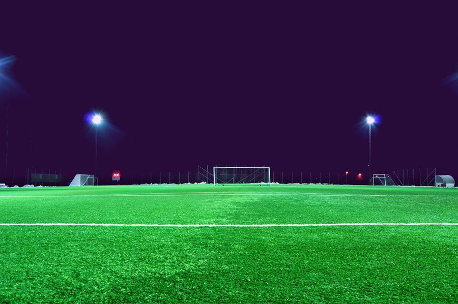 Floodlit sports field at night